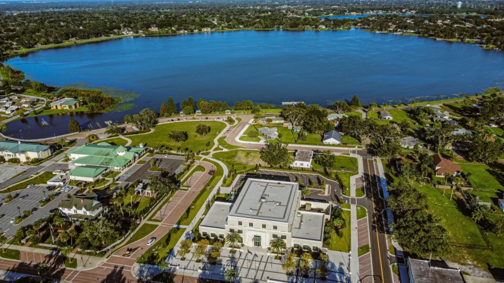 Aerial view of a lake and civic buildings in Ocoee, FL