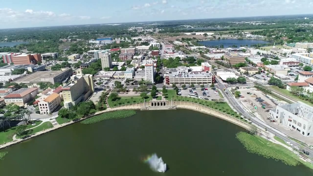 Aerial view of a downtown lakefront in Polk County, FL