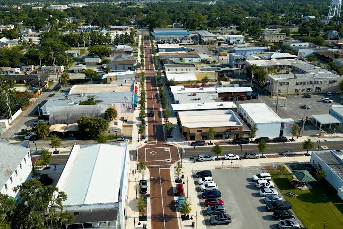 Aerial view of downtown St. Cloud, FL, along a brick main street